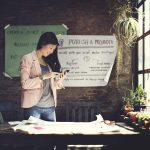 marketing professional smiling at her phone
