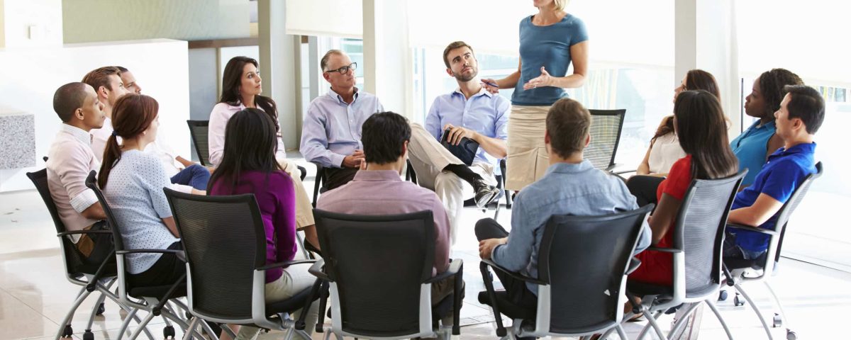 businesswoman discussing the company’s mission with her team