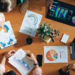 Local business leaders comparing marketing information