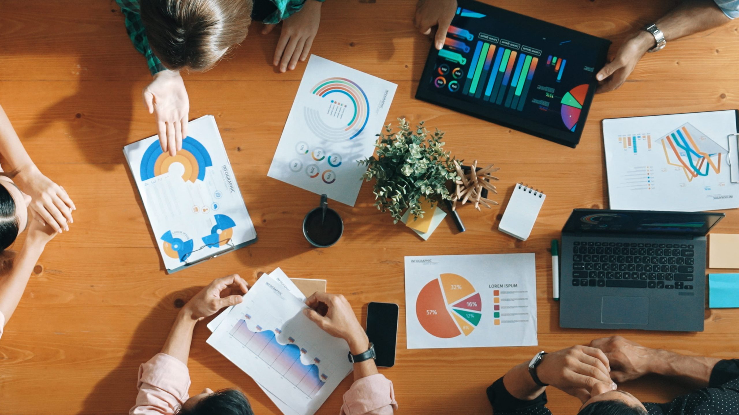 Local business leaders comparing marketing information